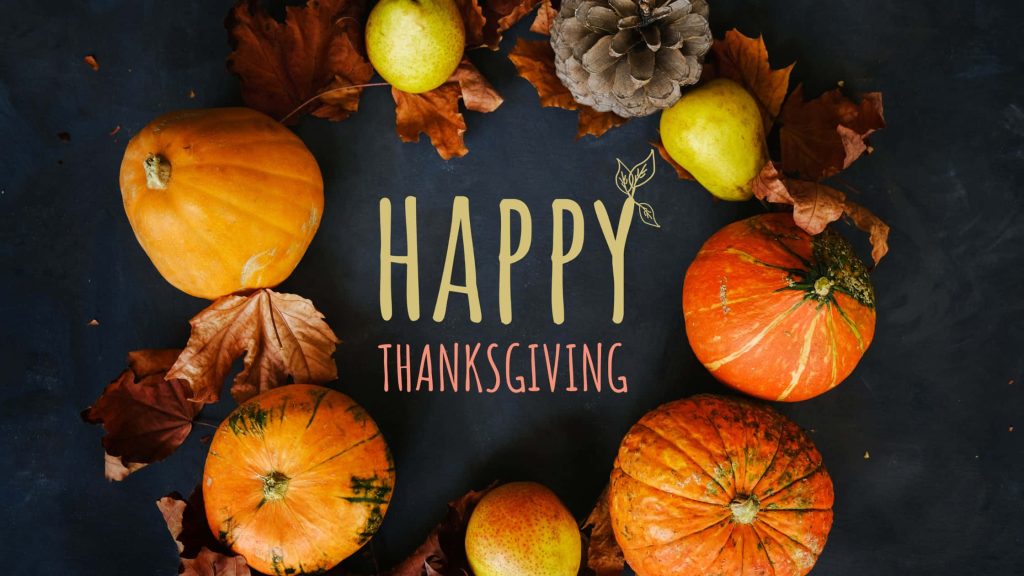 Cozy Happy Thanksgiving wallpaper with pumpkins pears pinecone and autumn leaves flat lay background