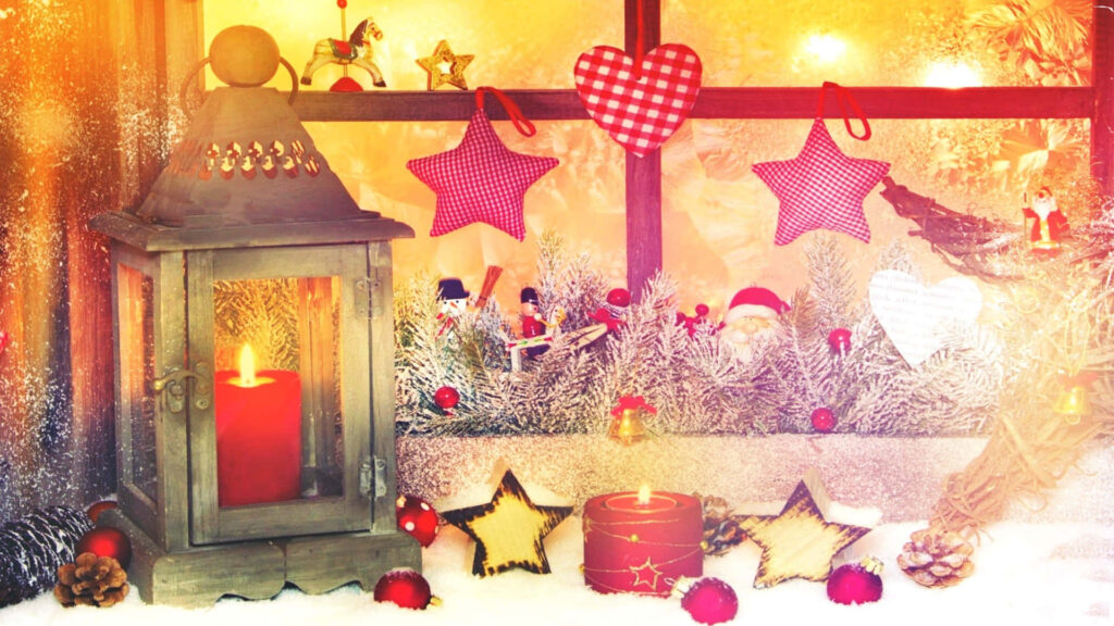 Cozy Holiday Wallpaper: Snowy Windowsill with Candle Lantern Magic