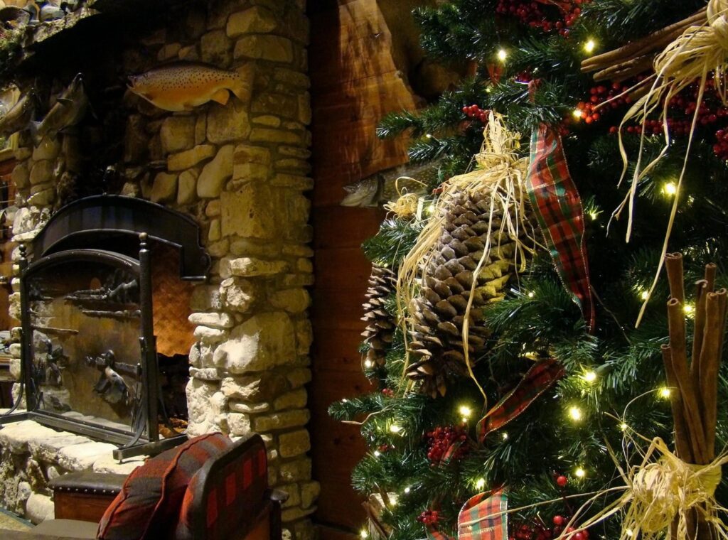 Cozy Christmas Wallpaper: Festive Tree & Rustic Fireplace Glow
