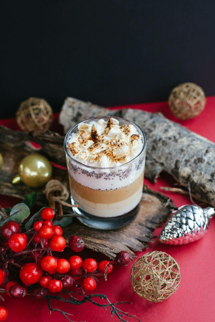 Cozy Christmas Wallpaper: Hot Drink with Whipped Cream & Festive Decor