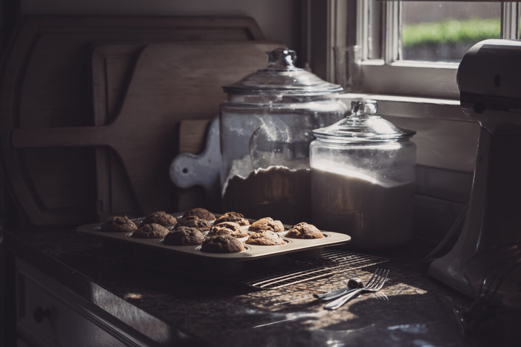 Cozy Kitchen with Freshly Baked Cookies and Soft Natural Light Wallpaper
