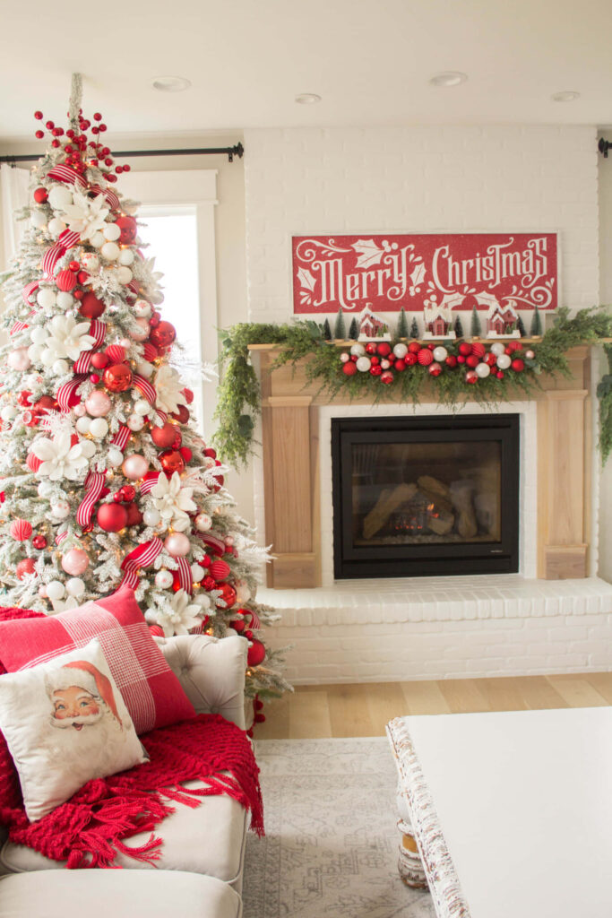 Cozy Living Room with Festive Red & White Christmas Decor Wallpaper