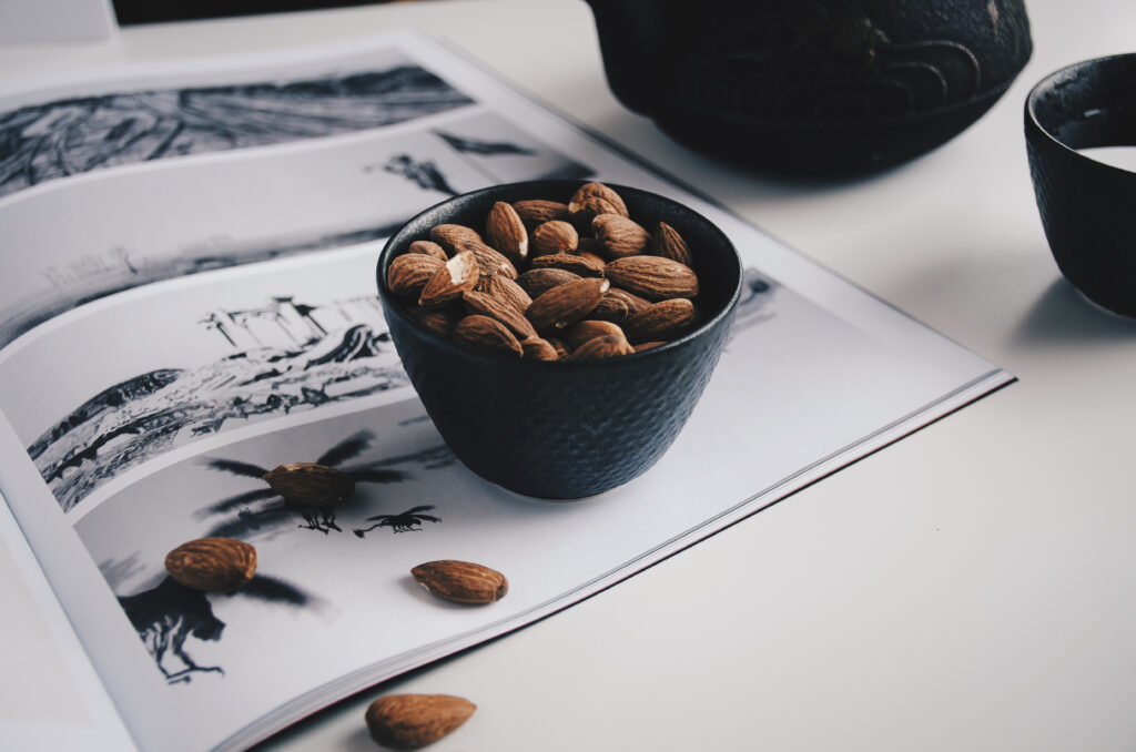 Cozy Minimalist Wallpaper: Almonds, Nuts & Magazine on Table