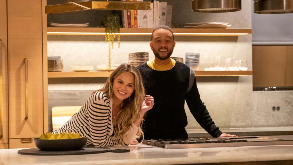 Cozy Modern Kitchen with Chrissy Teigen: Warm Lighting & Marble Touches Wallpaper