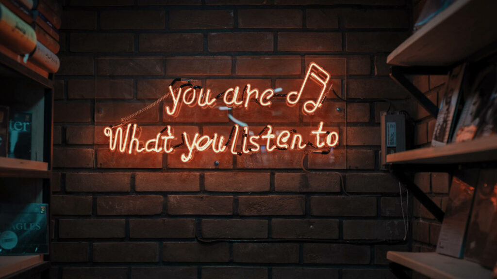 Cozy Neon Orange Wallpaper: 'You Are What You Listen To'