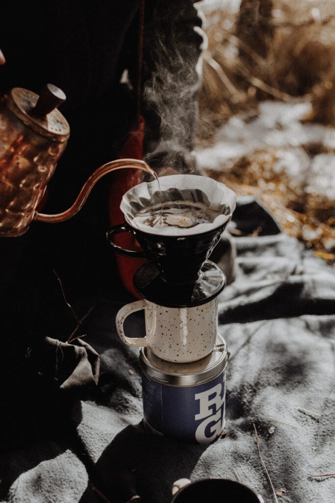 Cozy Outdoor Coffee Setup: Rustic Kettle & Pour-Over Vibe Wallpaper