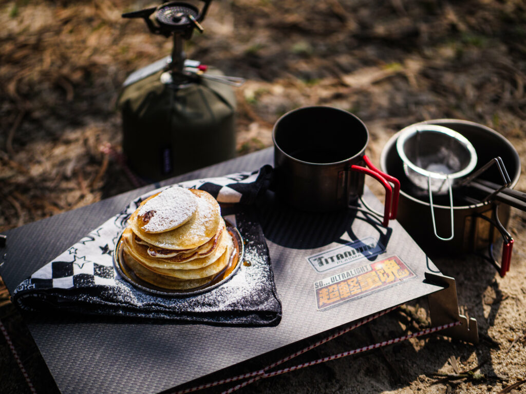 Cozy Pancake Stack with Coffee: Inviting Outdoor Wallpaper Scene