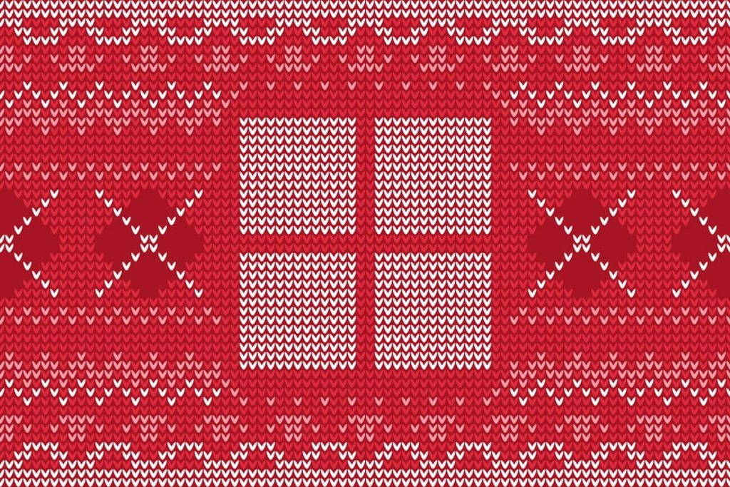 Festive Windows logo wallpaper with red and white knitted sweater pattern winter background