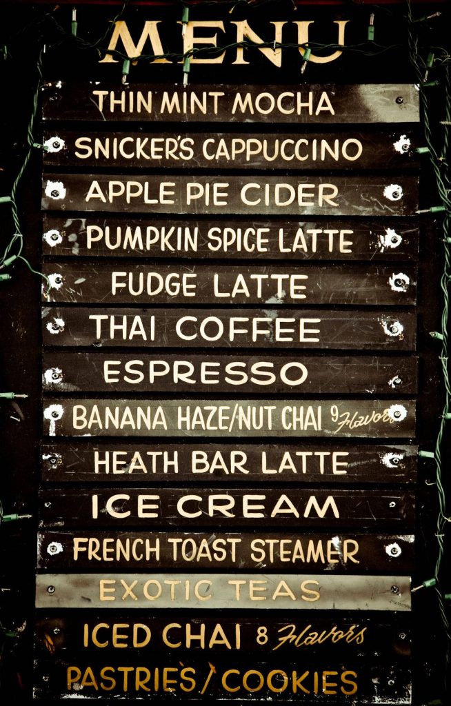 Rustic café photo wallpaper with dark wooden menu board and twinkling string lights ambiance