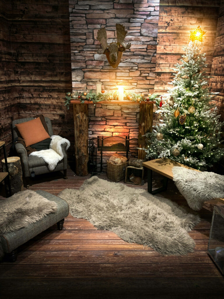 Cozy Rustic Christmas Wallpaper with Fireplace & Elegant Tree