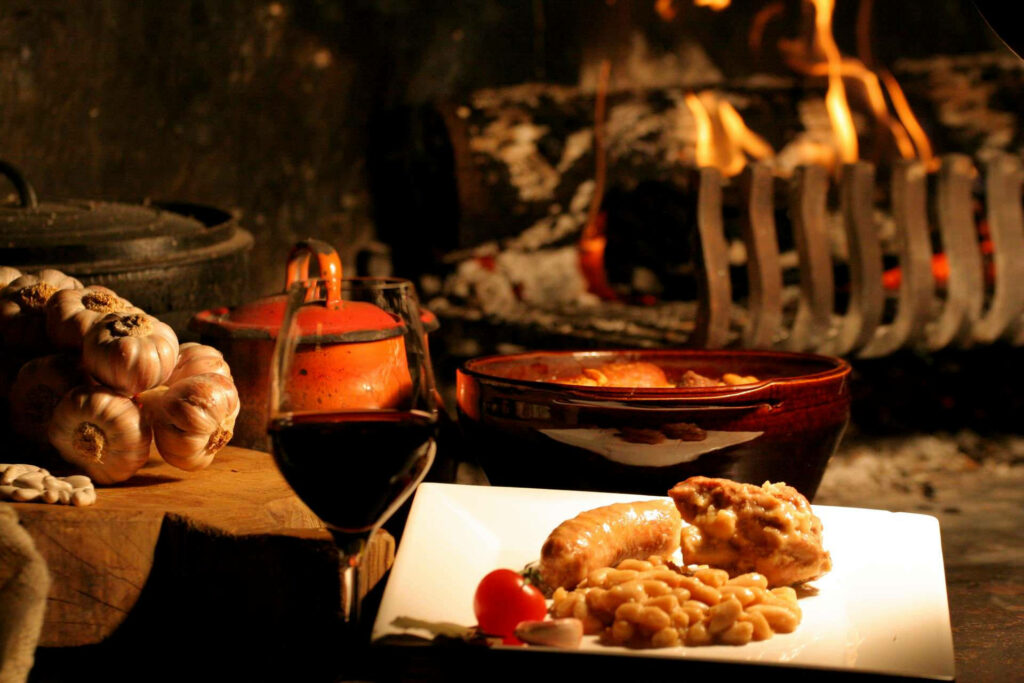 Warm Rustic Cassoulet Wallpaper with Wine & Fireplace Aesthetic