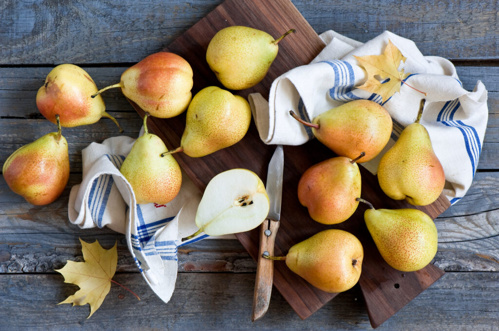 Cozy Autumn Rustic Pears on Wooden Board - Wallpaper Background