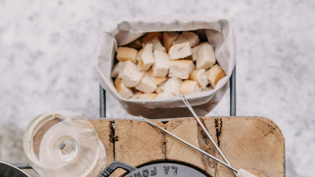 Cozy Rustic Wallpaper: Basket of Bread for Fondue Experience