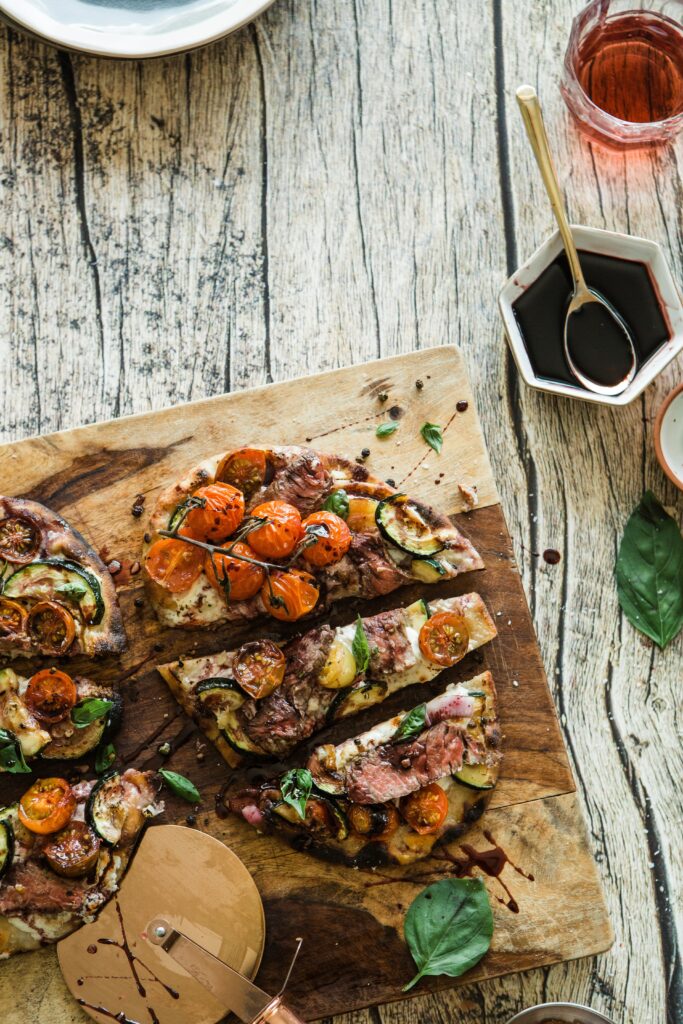 Rustic Pizza Wallpaper: Fresh Ingredients & Cozy Dining Vibes