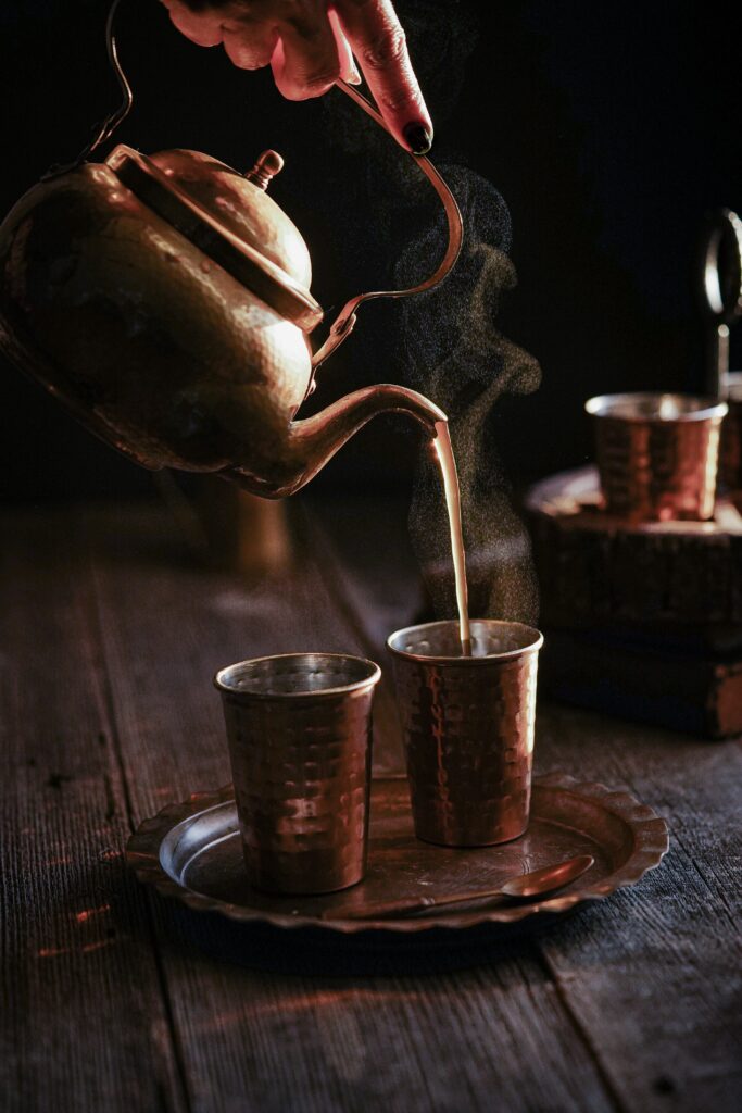 Cozy Rustic Wallpaper: Vintage Kettle & Steaming Tea in Copper Cups
