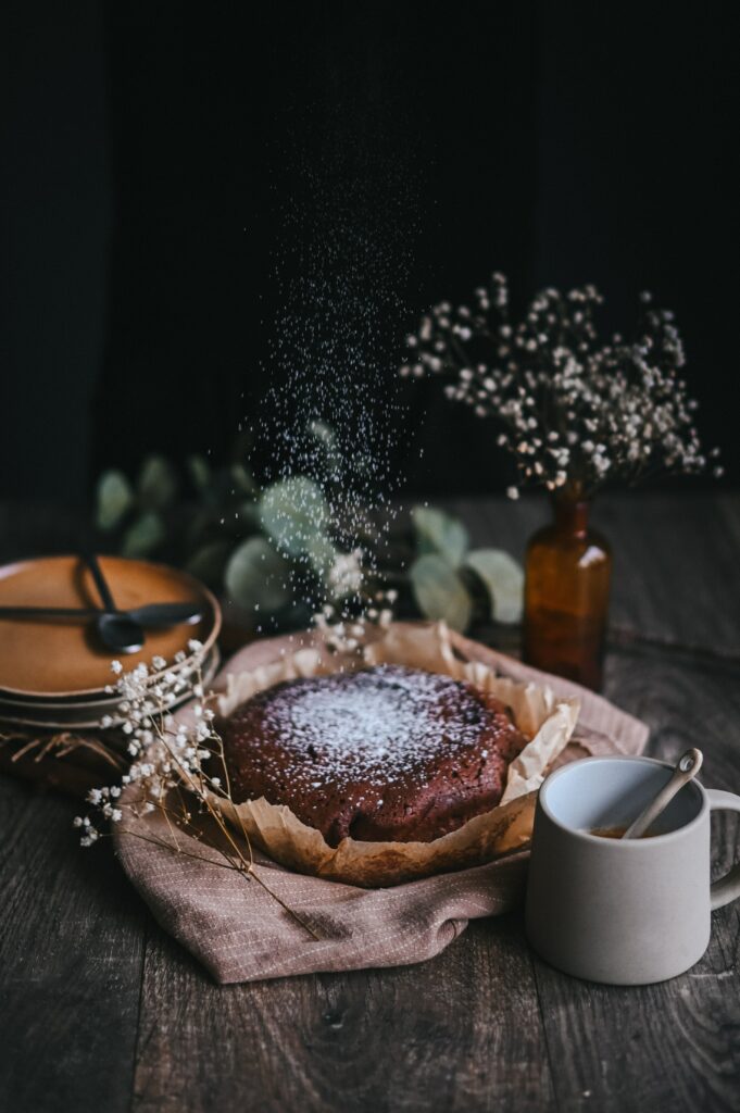 Cozy Still Life: Fresh Pie, Flowers & Rustic Decor Wallpaper