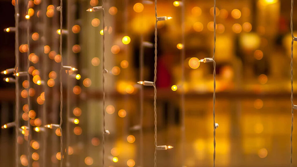 Cozy String Lights Wallpaper with Soft Golden Bokeh Background