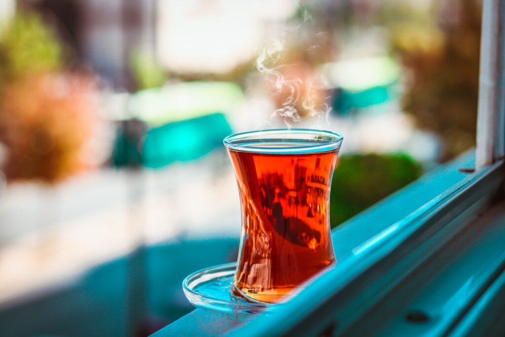 Serene Tea by the Windowsill: Comforting Wallpaper Background