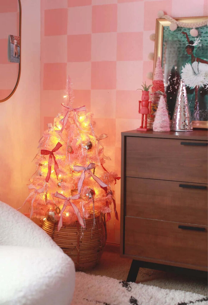 Cozy Vintage Corner with Pink Christmas Tree & Charming Decor Wallpaper