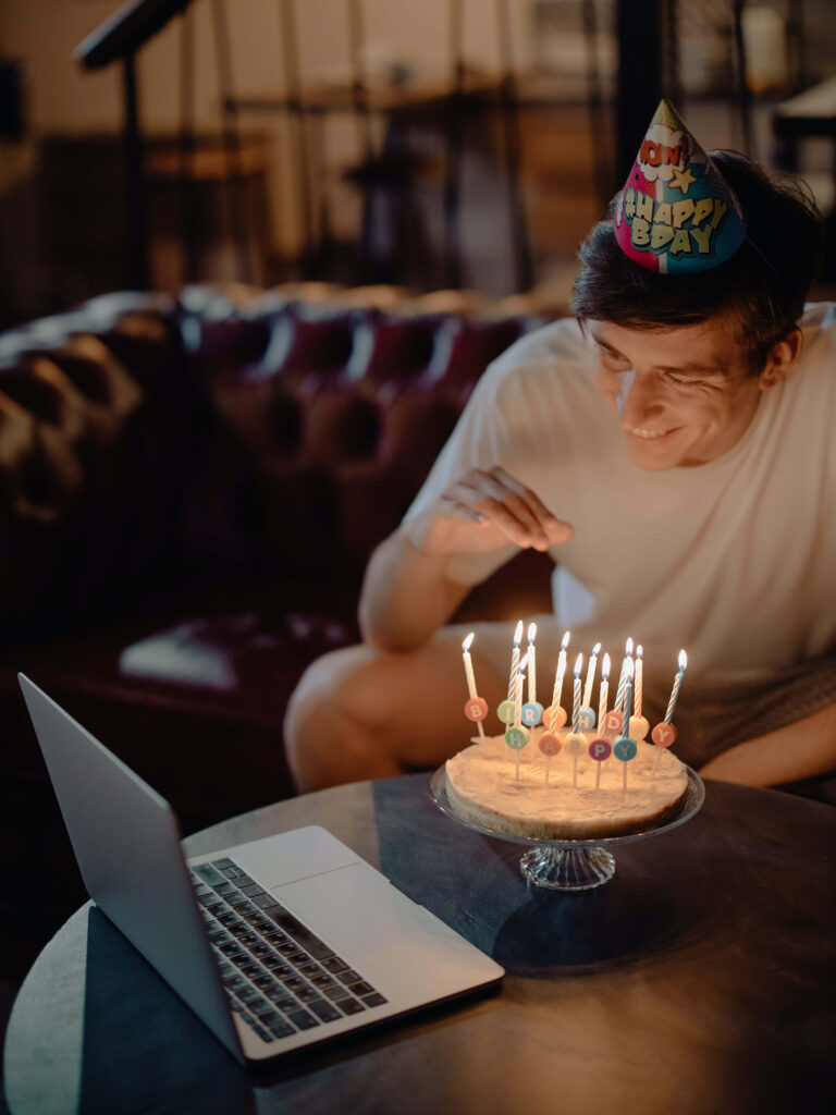 Virtual Birthday Celebration: Cozy Party with Cake & Laptop Wallpaper