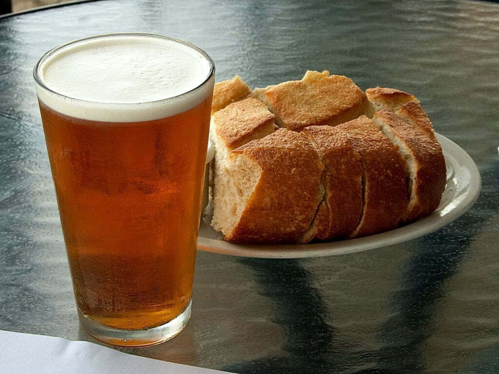 Cozy Wallpaper: Refreshing Beer & Fresh Bread for Warm Gatherings