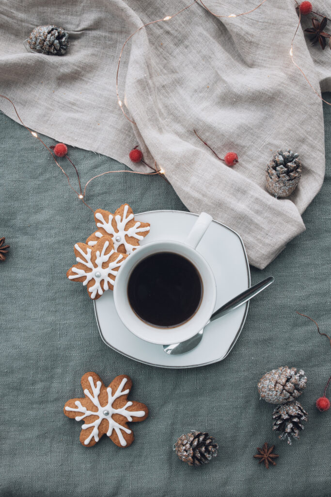 Cozy Holiday Wallpaper: Coffee Cup, Snowflake Cookies & Pinecones