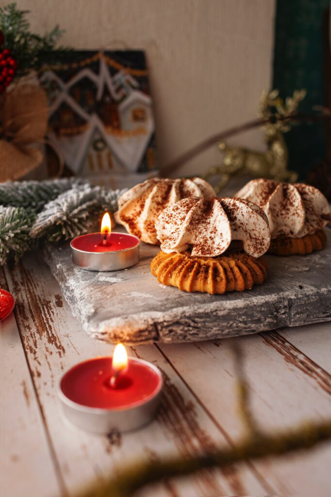 Cozy Wallpaper with Cookies, Cream, and Candles for a Festive Vibe