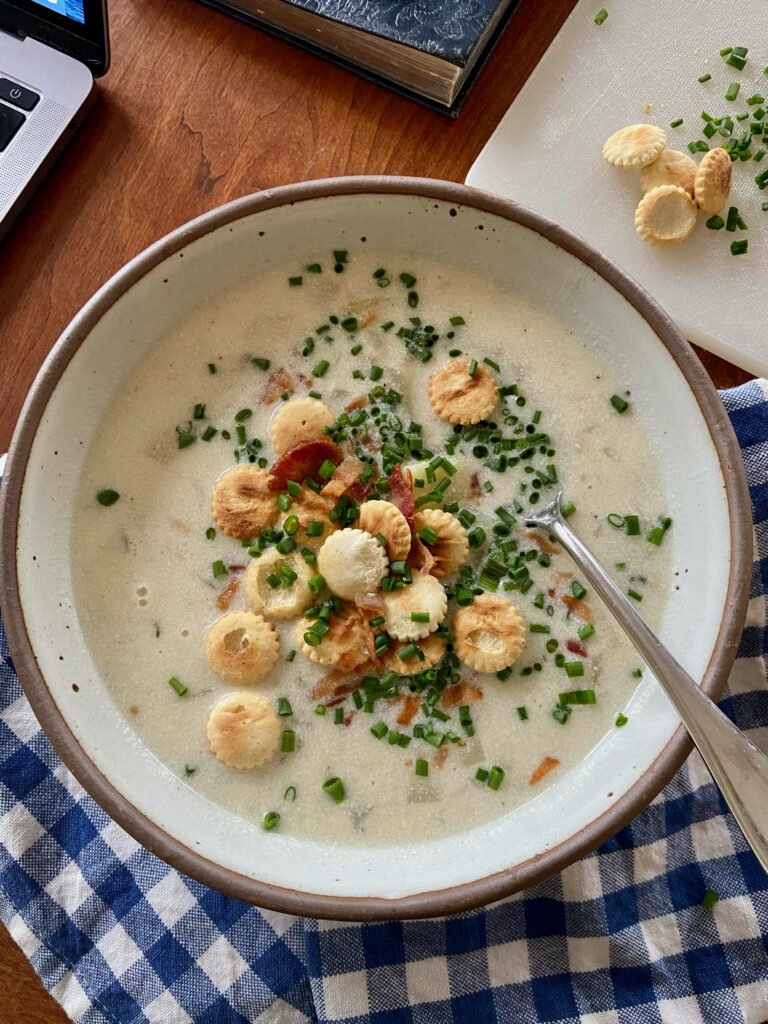 Cozy New England Clam Chowder Wallpaper with Fresh Spring Onions