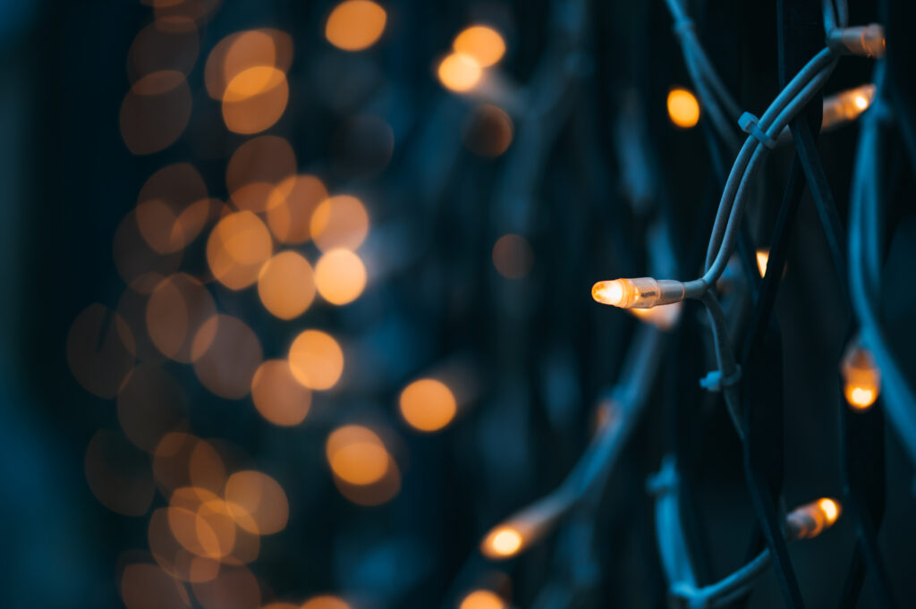 Cozy Macro Shot of Glowing Light Bulbs with Bokeh Wallpaper