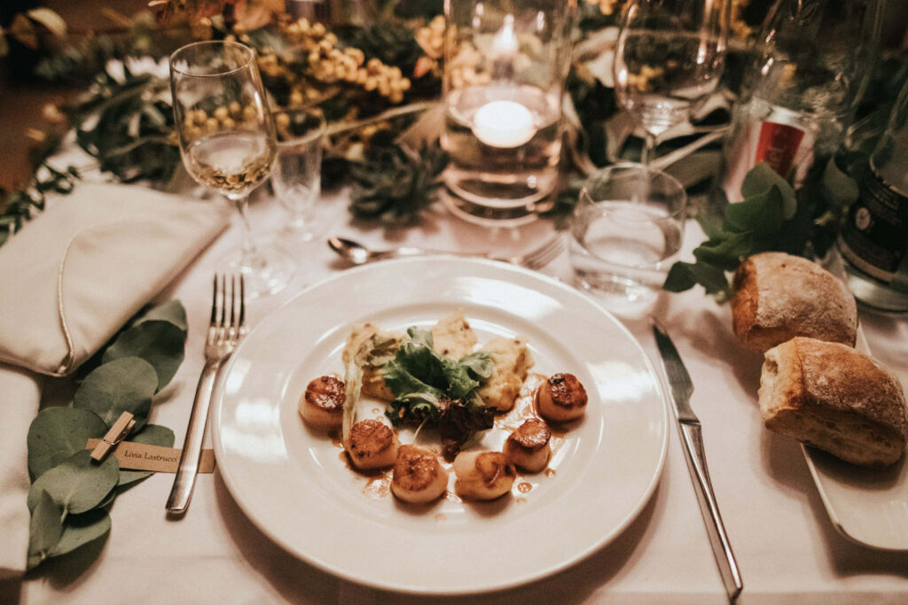 Cozy Winter Meal Setup: Elegant Tableware & Warm Ambiance Wallpaper