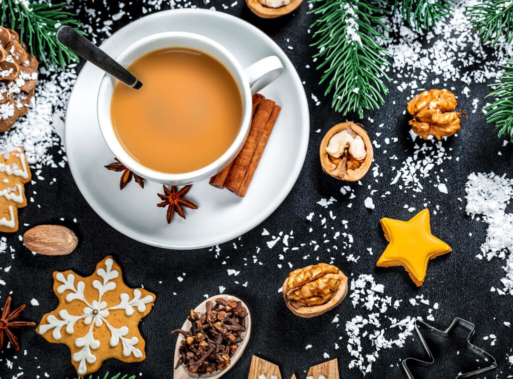 Cozy Winter Wallpaper: Warm Tea, Gingerbread, & Festive Decor