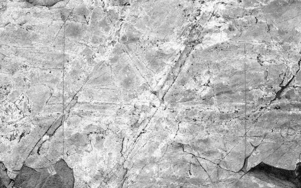 Cracked Elegance: Exploring Grunge Stone Textures in Gray 4K Wallpapers