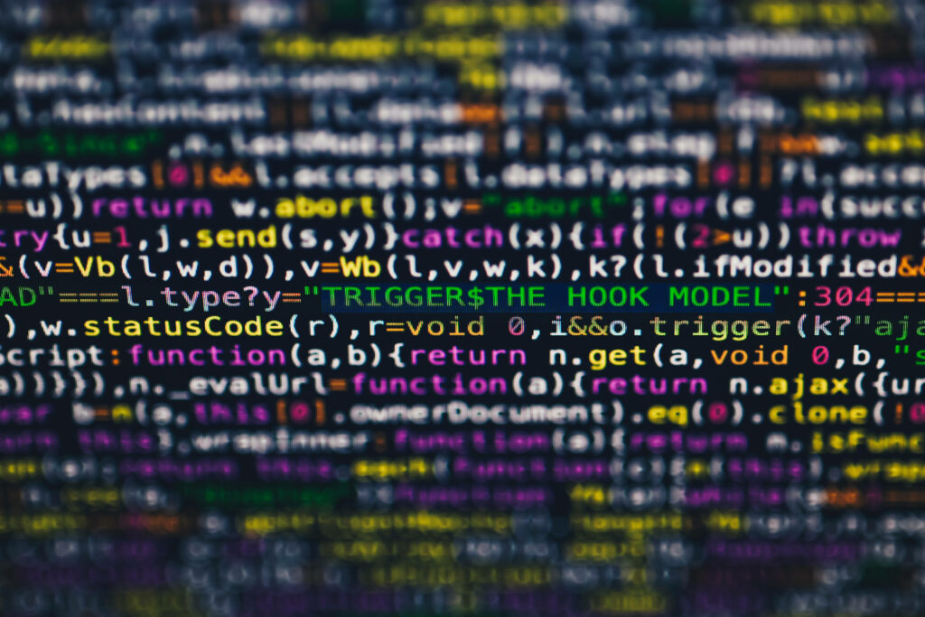 Unveiling the Enigma of Coding: A Blurred Dive into the Realm of Letters and Code Wallpaper