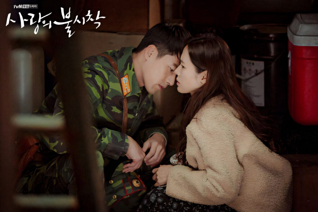 Yoon Se-ri and Ri Jeong-hyeok romantic moment Crash Landing On You warm lighting wallpaper background