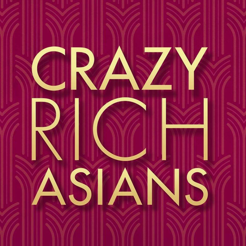 Crazy Rich Asians wallpaper with gold lettering and maroon Art Deco pattern showcasing luxury