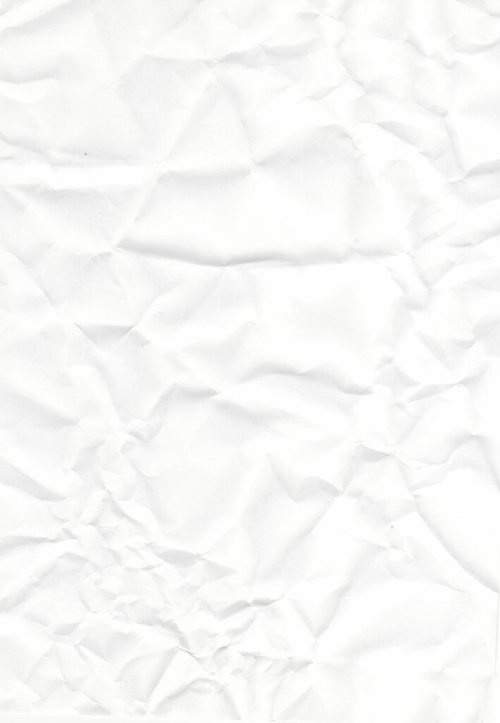 High-resolution white crumpled paper texture wallpaper with intricate creases and soft shadows