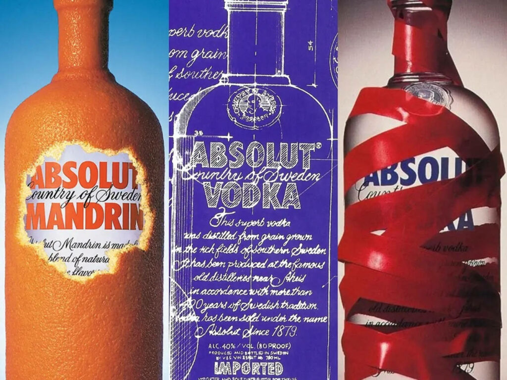Creative Absolut vodka poster collage with artistic bottle designs showcasing unique branding Wallpaper