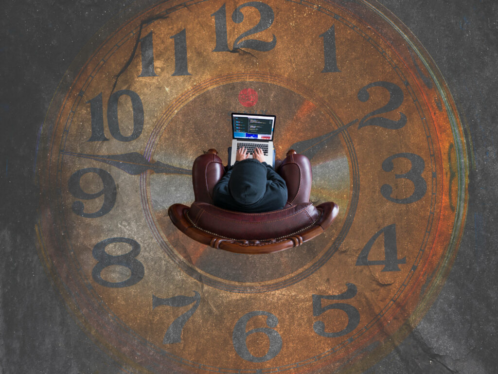 Unique Coding Wallpaper: Laptop & Vintage Clock Fusion Background