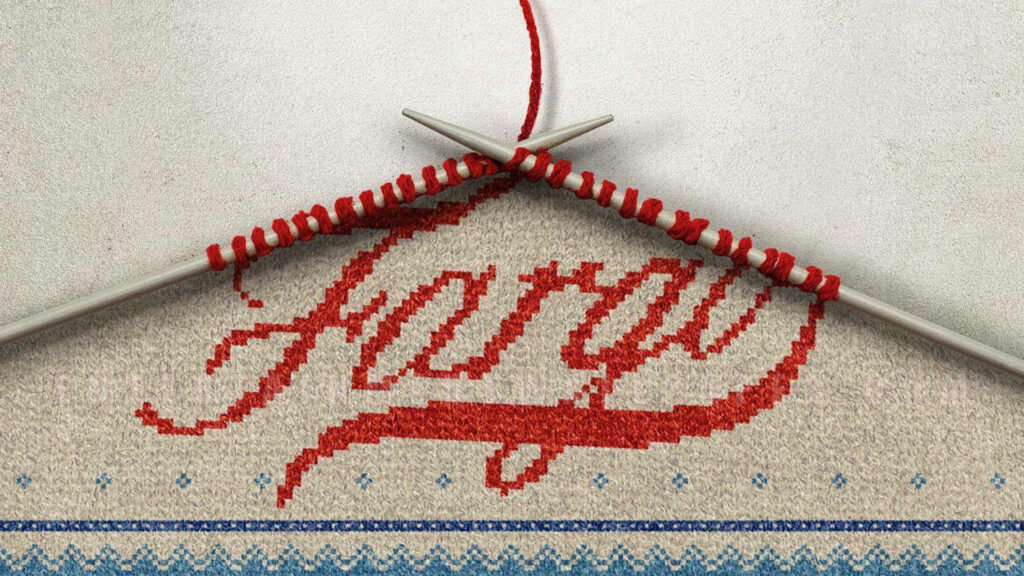 Knitted Fargo word in red yarn on fabric with traditional blue pattern wallpaper background