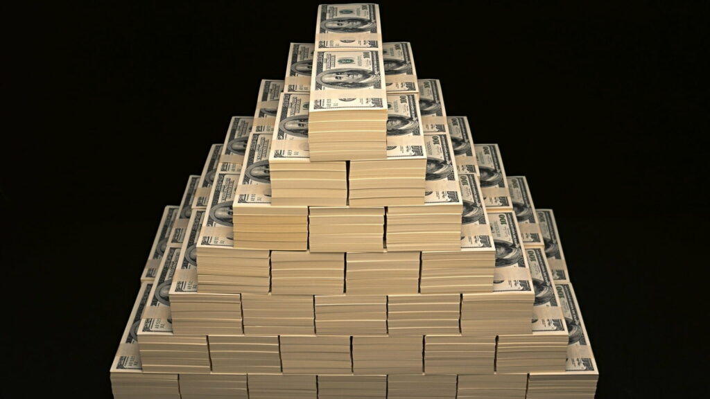 Symmetrical pyramid of US 100 dollar bills with detailed Benjamin Franklin portraits on black background Wallpaper