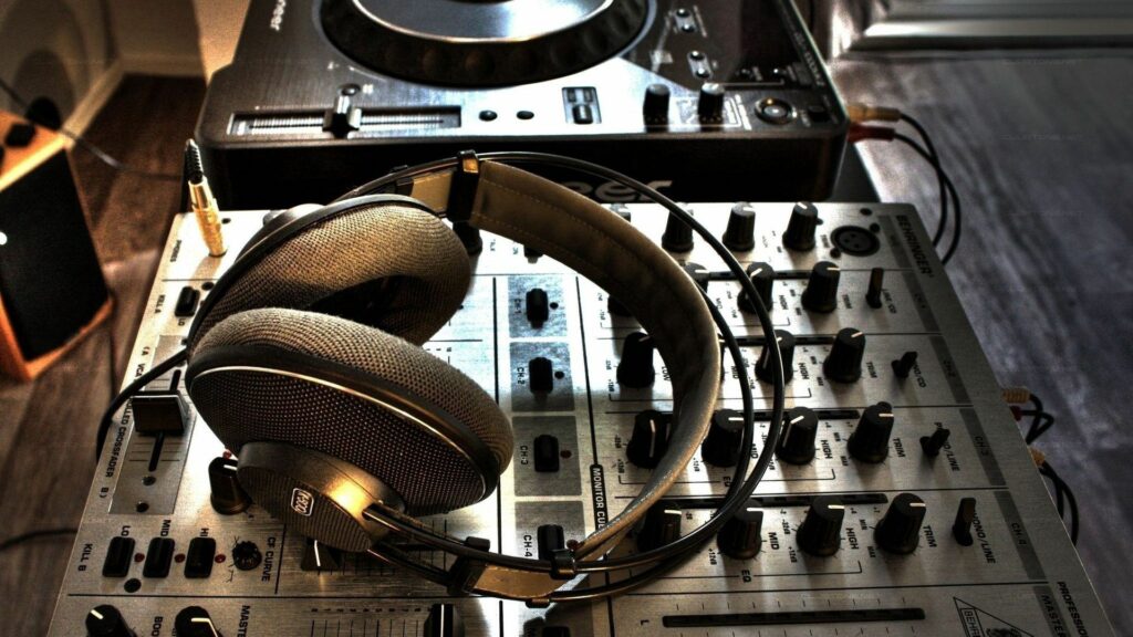 Creative Music Production Wallpaper: Headphones & Mixer Setup