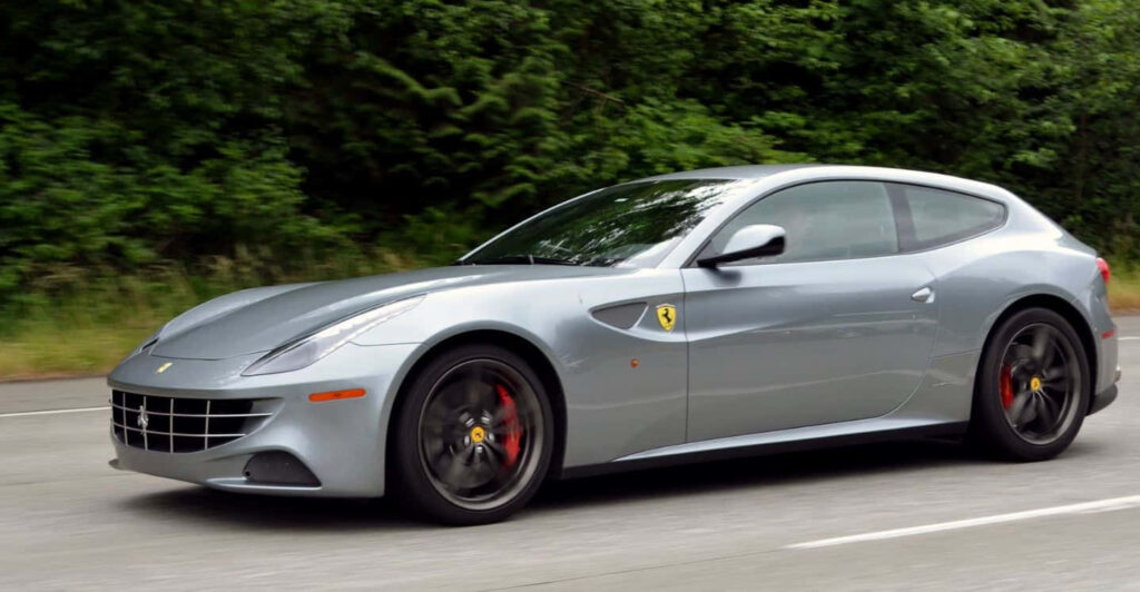 Blue Ferrari FF on a Road Background Wallpaper