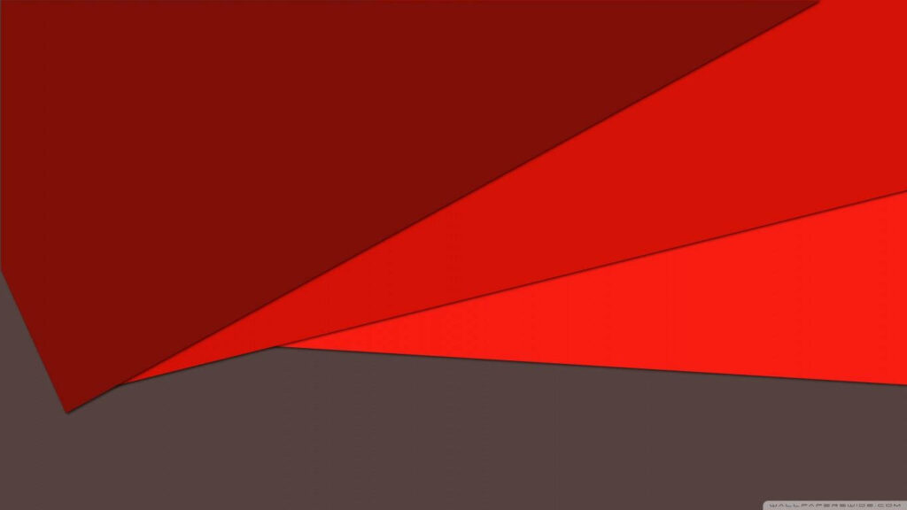 Vibrant Extrusions: Exploring Red Geometric Forms on a Dark Canvas Wallpaper