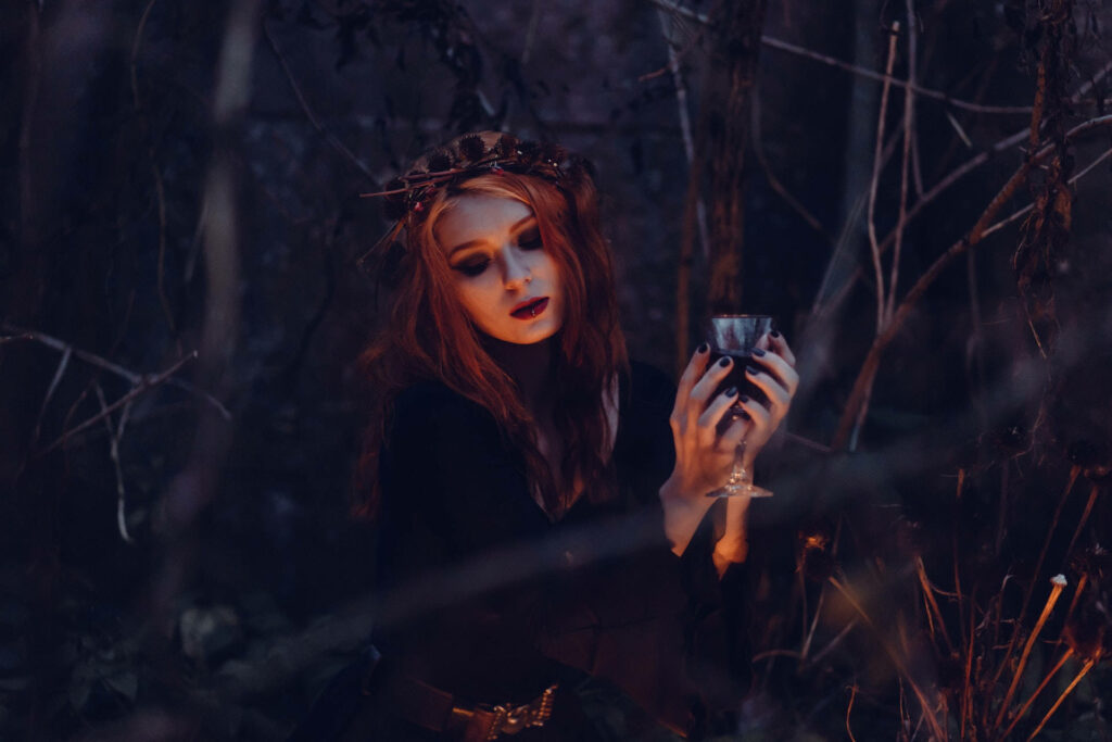 Gothic Siren Sips from the Abyss: A Hauntingly Beautiful 1920x1080 HD Dark Background Photo Wallpaper