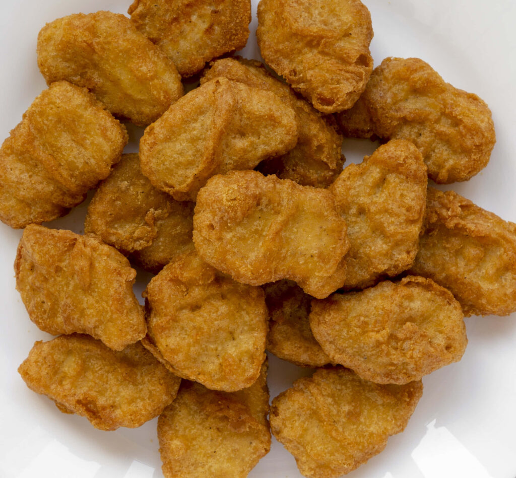 Crispy Golden-Brown Chicken Nuggets Wallpaper Background