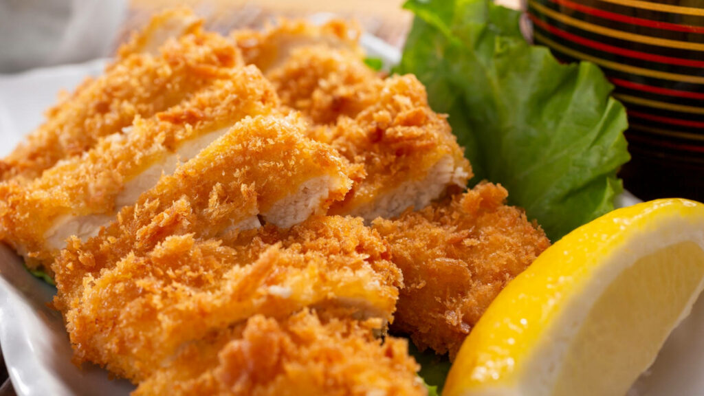 Crispy Golden Tonkatsu with Lemon & Lettuce - Wallpaper Background
