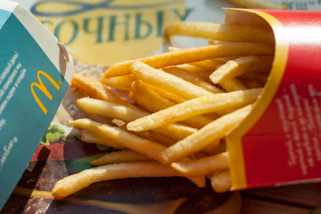 McDonald's Crispy French Fries Wallpaper Background - Golden Appeal