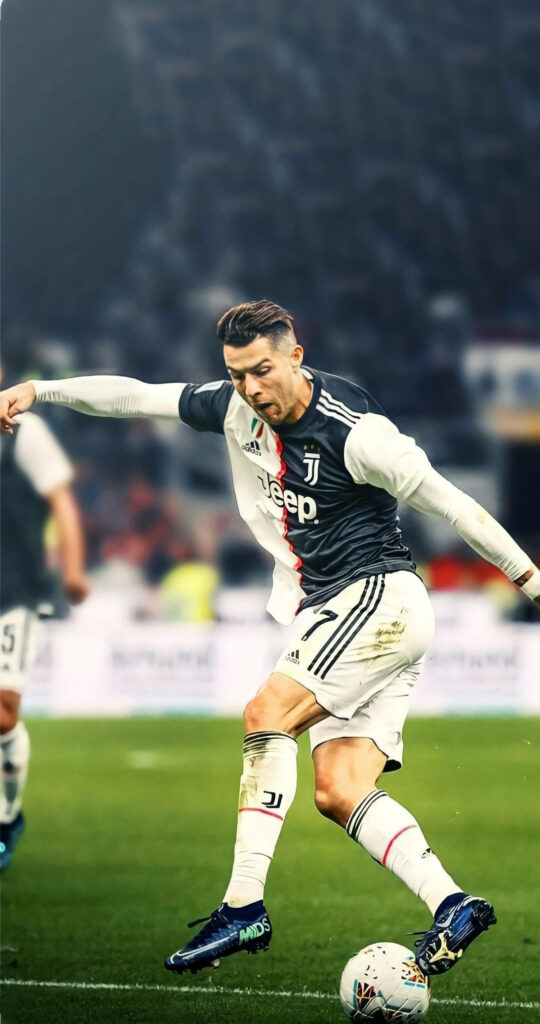 Dynamic Cristiano Ronaldo iPhone Wallpaper: Skill & Intensity in Action