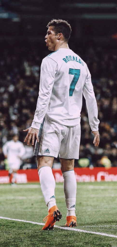 Dynamic Cristiano Ronaldo Wallpaper - Iconic Number 7 in Action