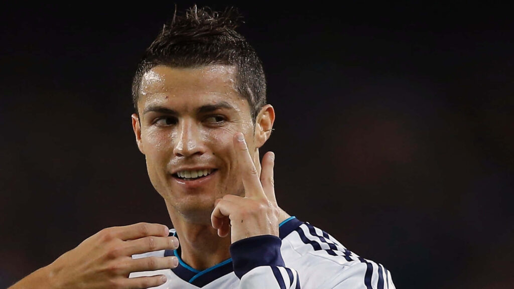 Dynamic Cristiano Ronaldo Wallpaper: Charisma on the Football Field